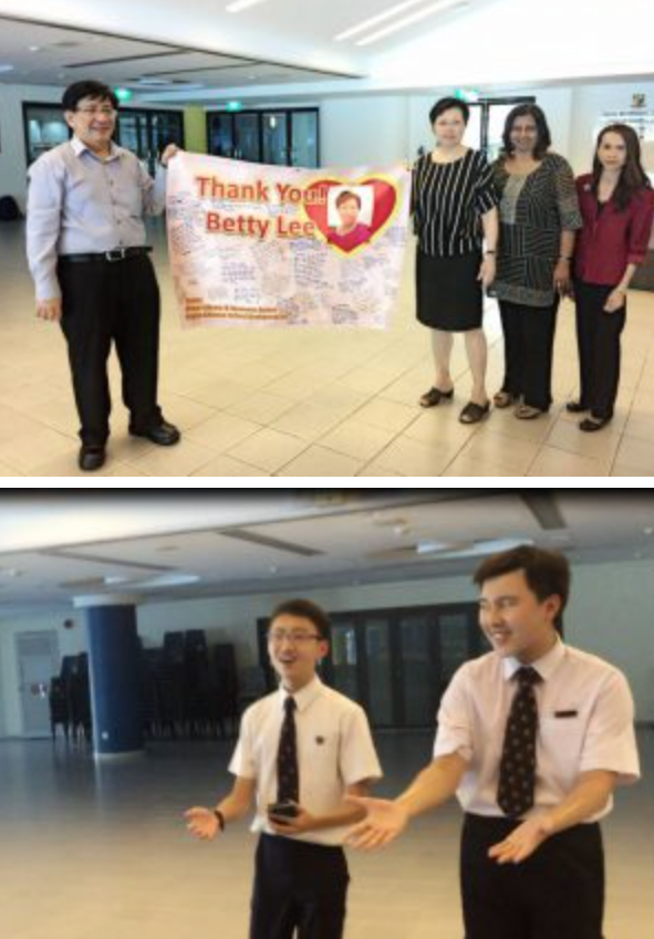 Four people hold a Thank You Betty Lee banner indoors; below, two young men in shirts and ties gesture and smile.